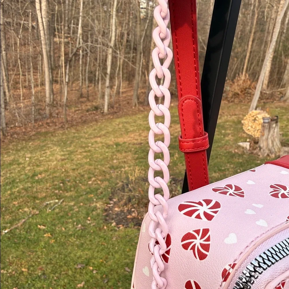 Reposhing this sweet Betsey Johnson Pink and Red Gift Bow Crossbody Clutch